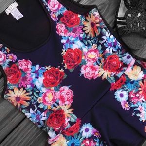 Floral peplum tank top.